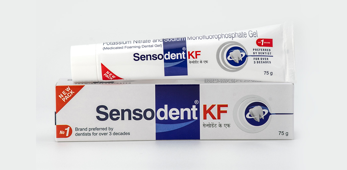 Product photo of Sensodent KF toothpaste showcasing its packaging details